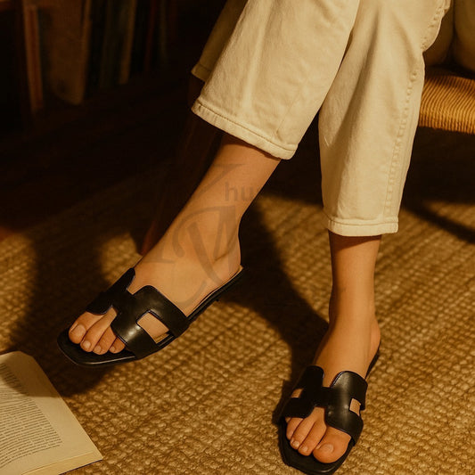 "Designer black slipper inspired by Hermes"